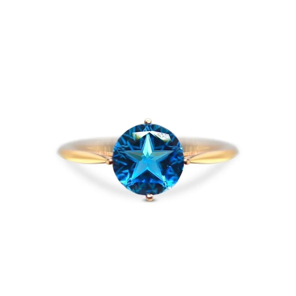 TEXAS STAR CUT BLUE TOPAZ RING IN AUSTIN, TX.